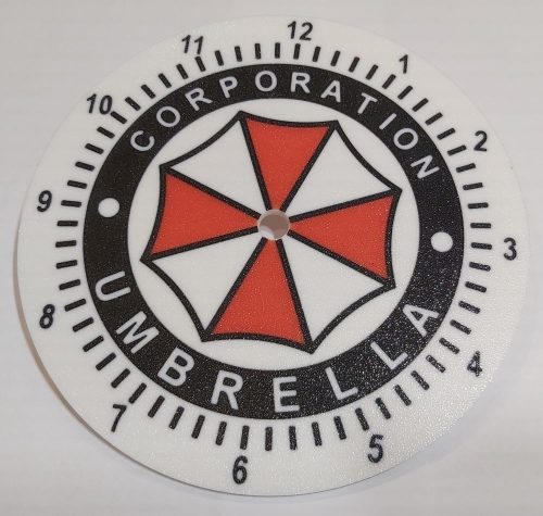 Egyedi falióra Umbrella corporation 175mm, óratartó házzal, óraszerkezet nélkül. KAPHATÓ !!!